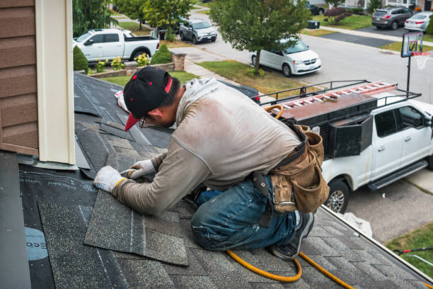 Professional Roofing technician working in Palm City, FL